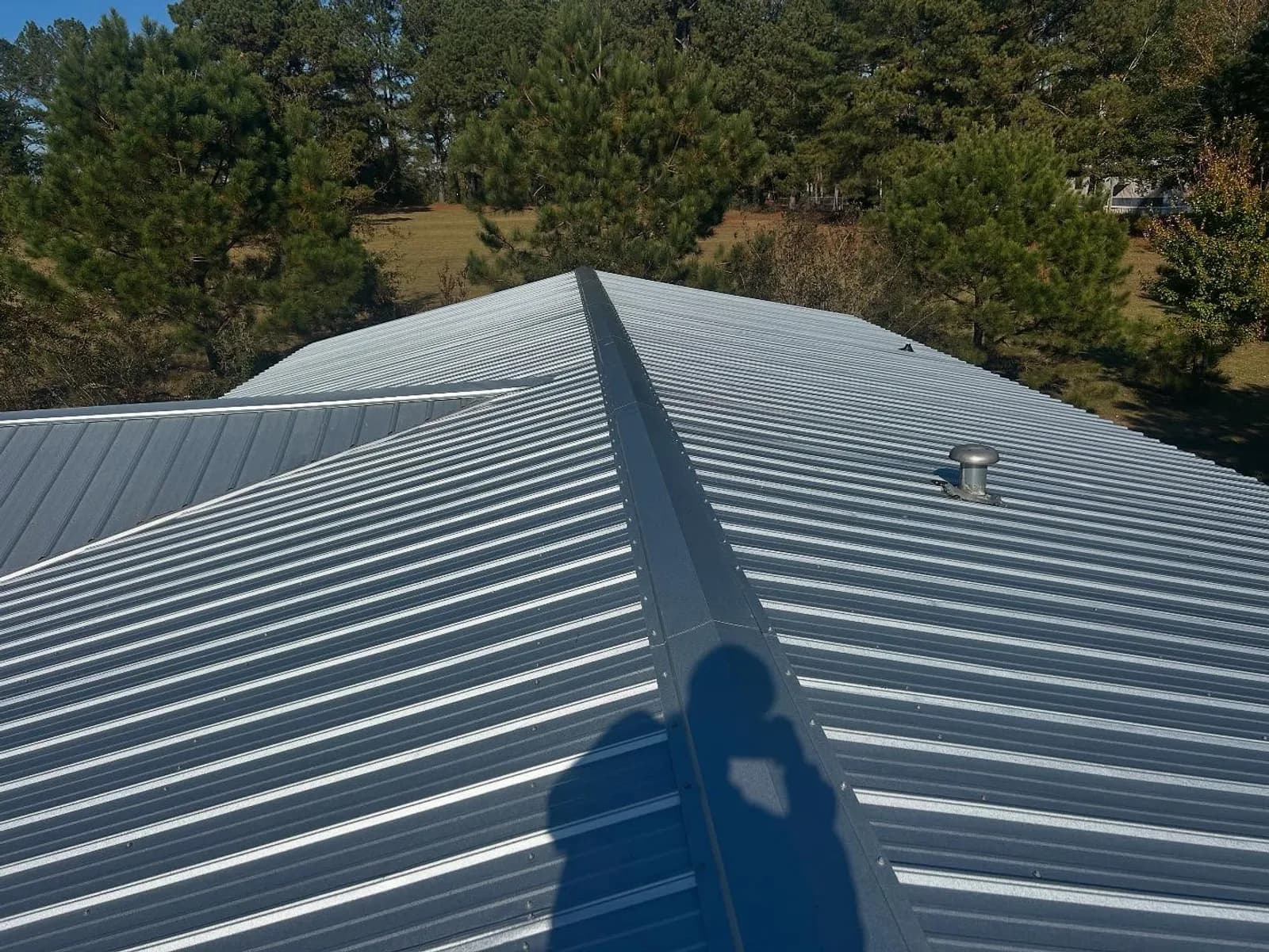 29ga Gibraltar Rib Galvalume exposed-fastener metal roof installed by Southeast Roofing in McComb, Mississippi.