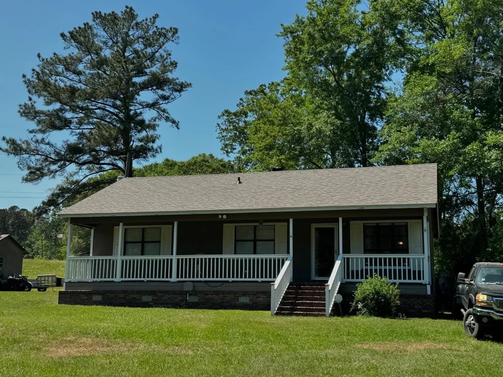 Owens Corning Duration shingles in Driftwood — roof completed by Southeast Roofing in Waynesboro, Mississippi.