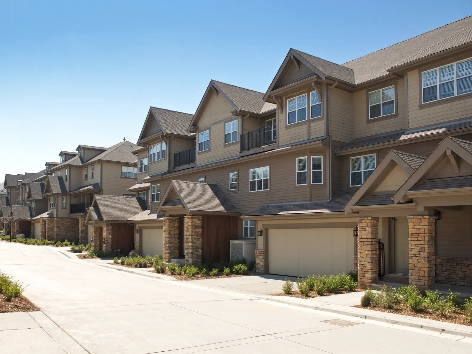 Garden-style apartment buildings with architectural shingle roofs