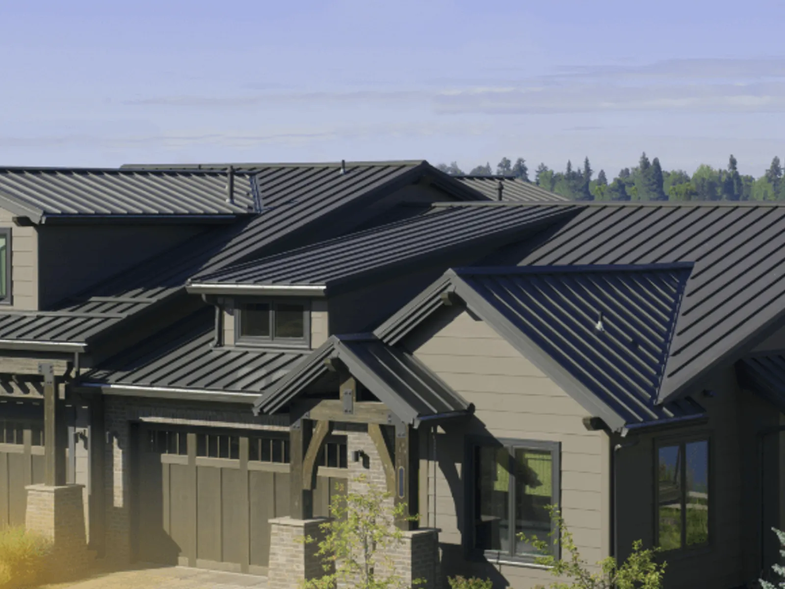 Homes with dark standing seam metal roofs