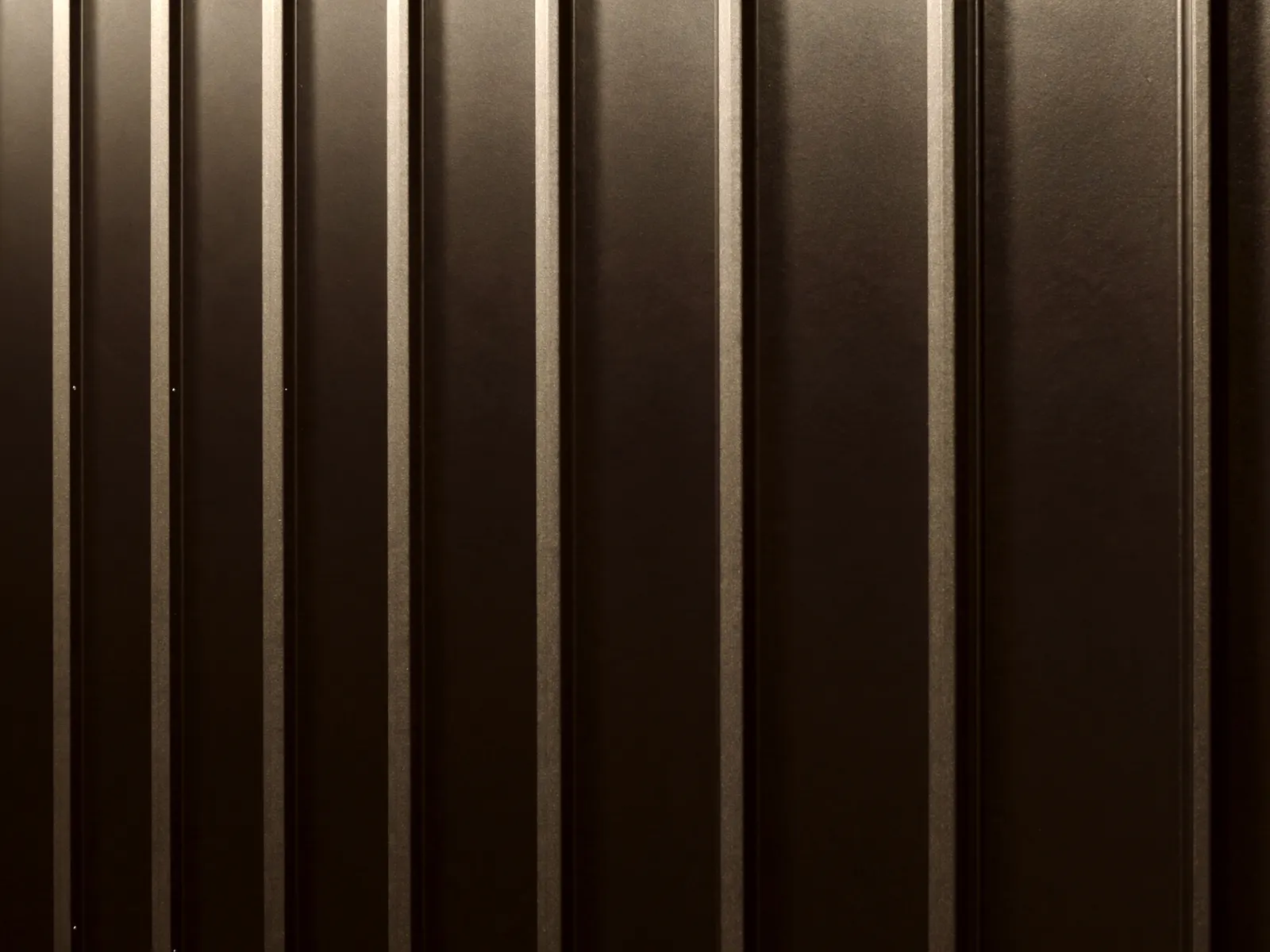 Close-up of standing seam metal roof panels with concealed fasteners