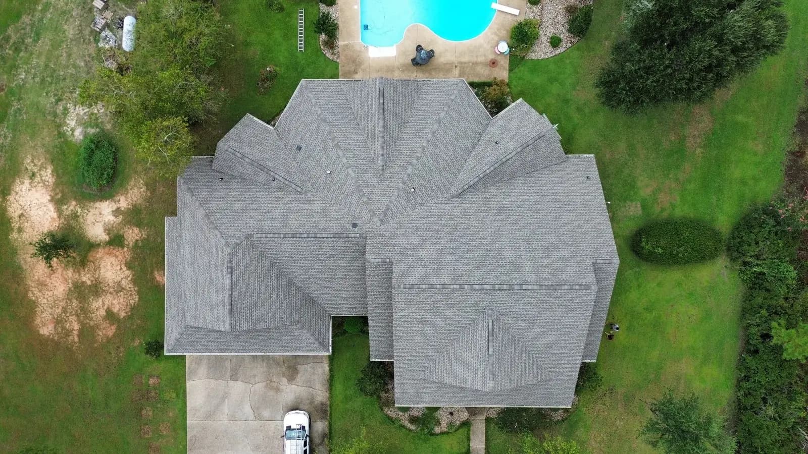 Aerial view of a completed Southeast Roofing shingle replacement in Purvis, Mississippi, in GAF Timberline HDZ Weathered Wood