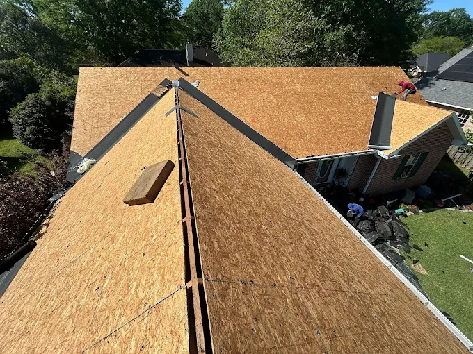 Tear-off down to the decking during a Southeast Roofing roof replacement in Poplarville, Mississippi.